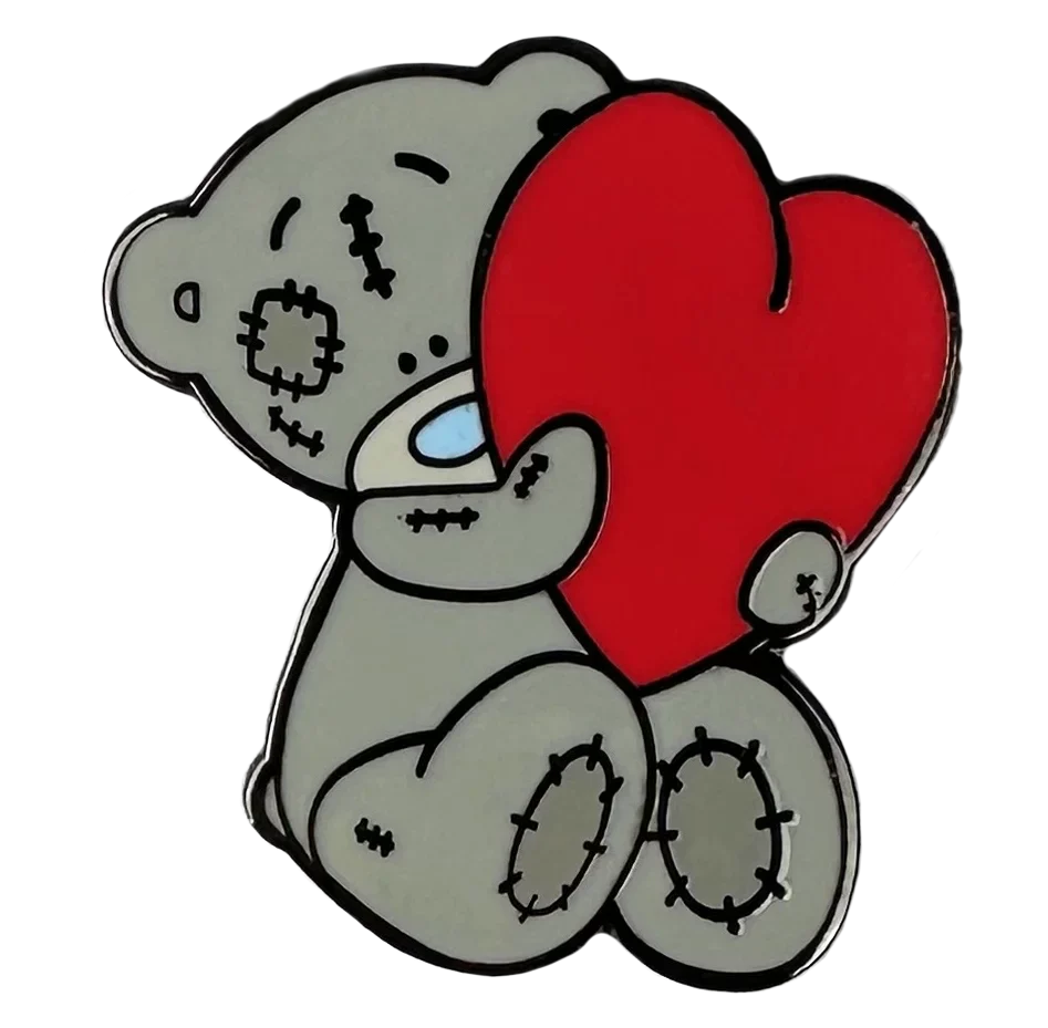 a sticker of a teddy bear holding a heart