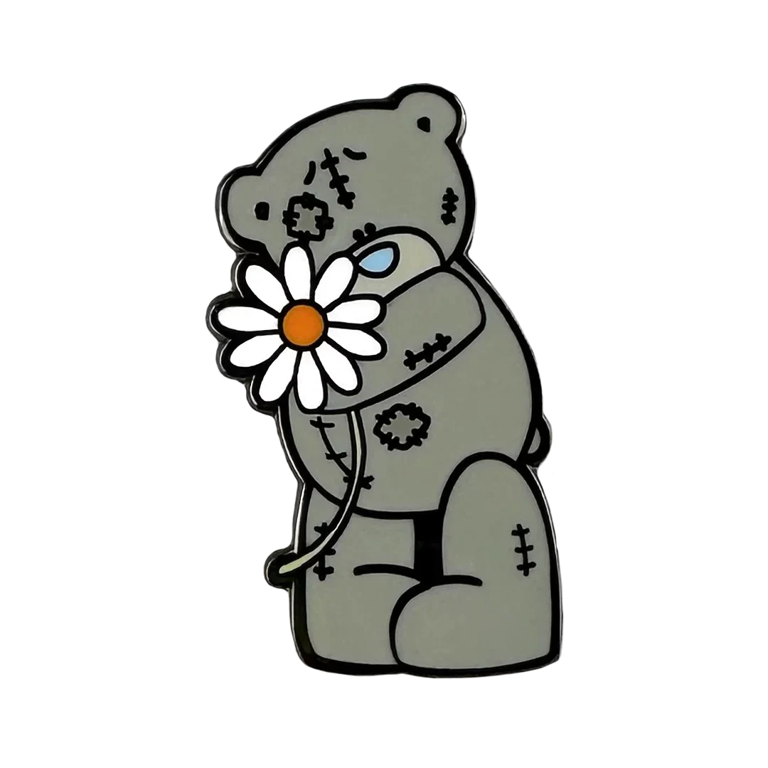 a picture of a teddy bear holding a flower