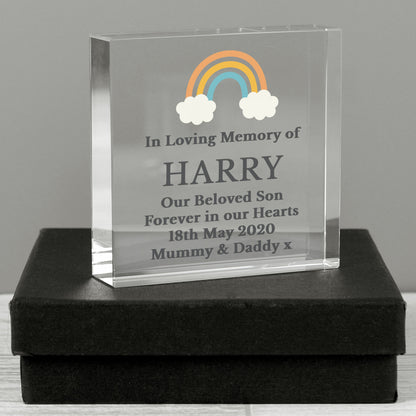 a clear glass plaque with a rainbow on it