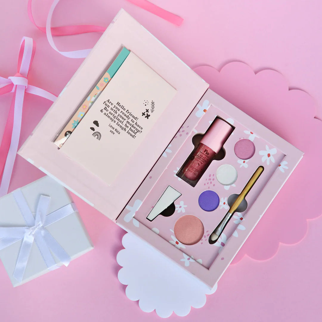 a pink box with a pink ribbon and a white box with a pink bow and