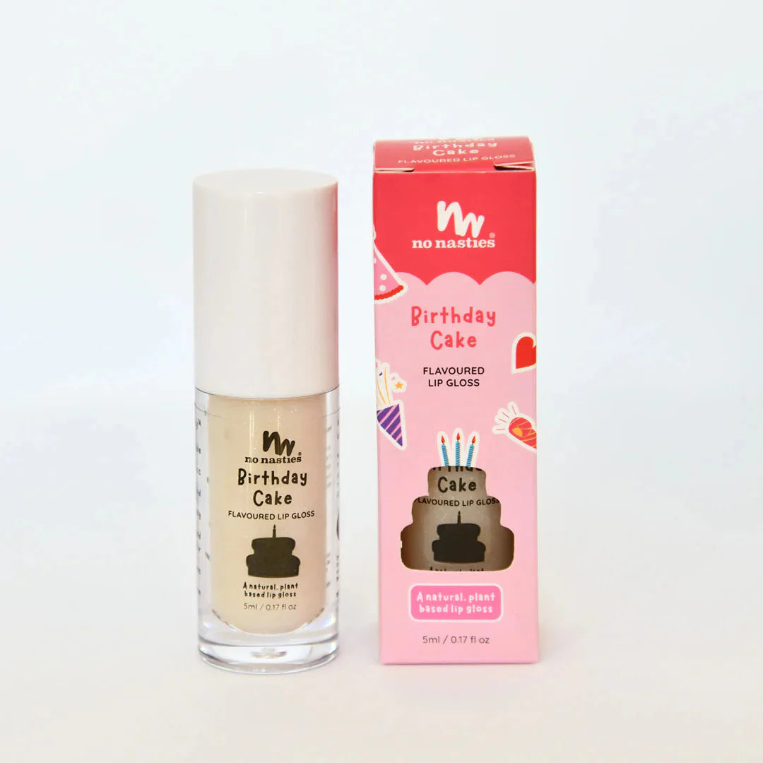 a bottle of birthday cake nail polish next to a box