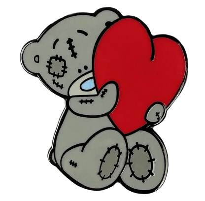 a sticker of a teddy bear holding a heart