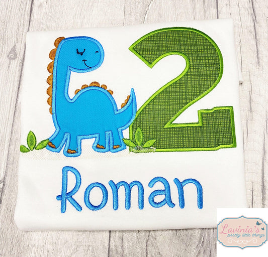 a dinosaur birthday shirt with the number two on it
