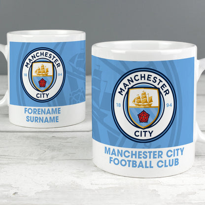 two mugs of manchester city football club on a table