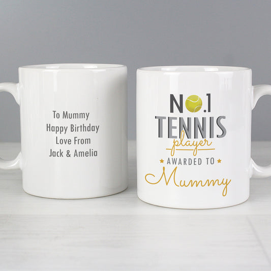two personalized coffee mugs sitting on a table
