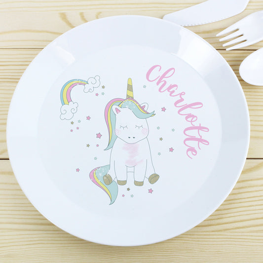 a white plate with a unicorn on it