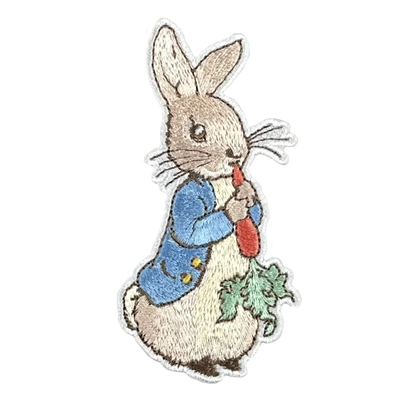 a picture of a rabbit holding a carrot
