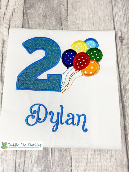 a birthday shirt with balloons and the number two on it