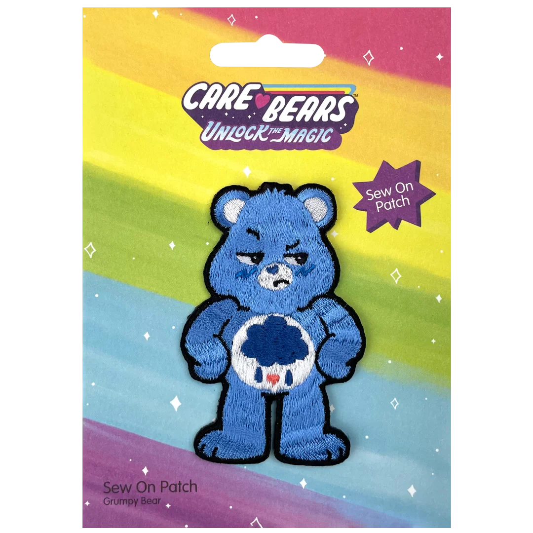 a blue teddy bear holding a ball of yarn