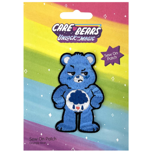 a blue teddy bear holding a ball of yarn