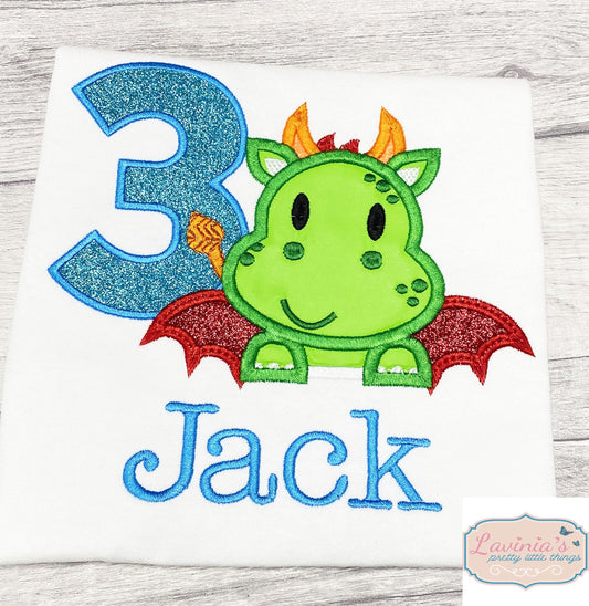 a birthday shirt with a green dragon on it