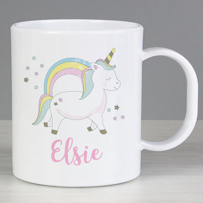 a white coffee mug with a unicorn on it