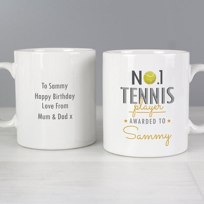 two white coffee mugs sitting on top of a table