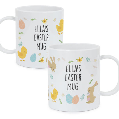 two white coffee mugs with easter designs on them