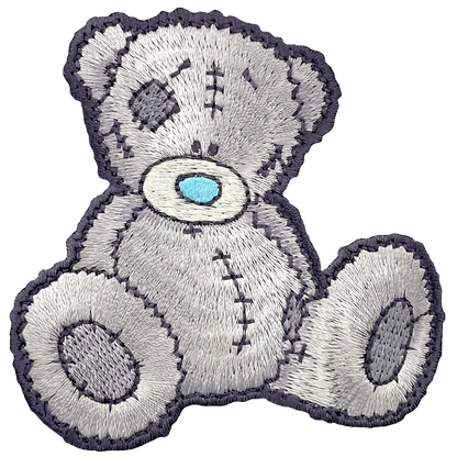 a teddy bear with a sad look on its face