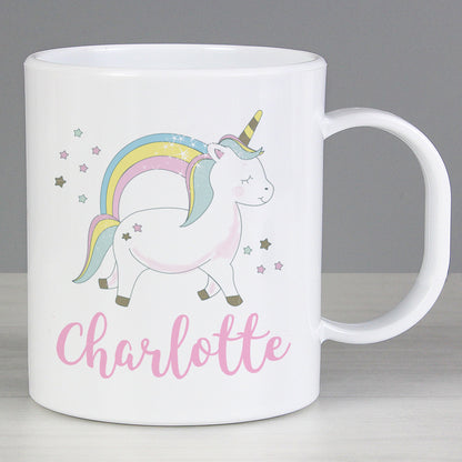a white coffee mug with a unicorn on it
