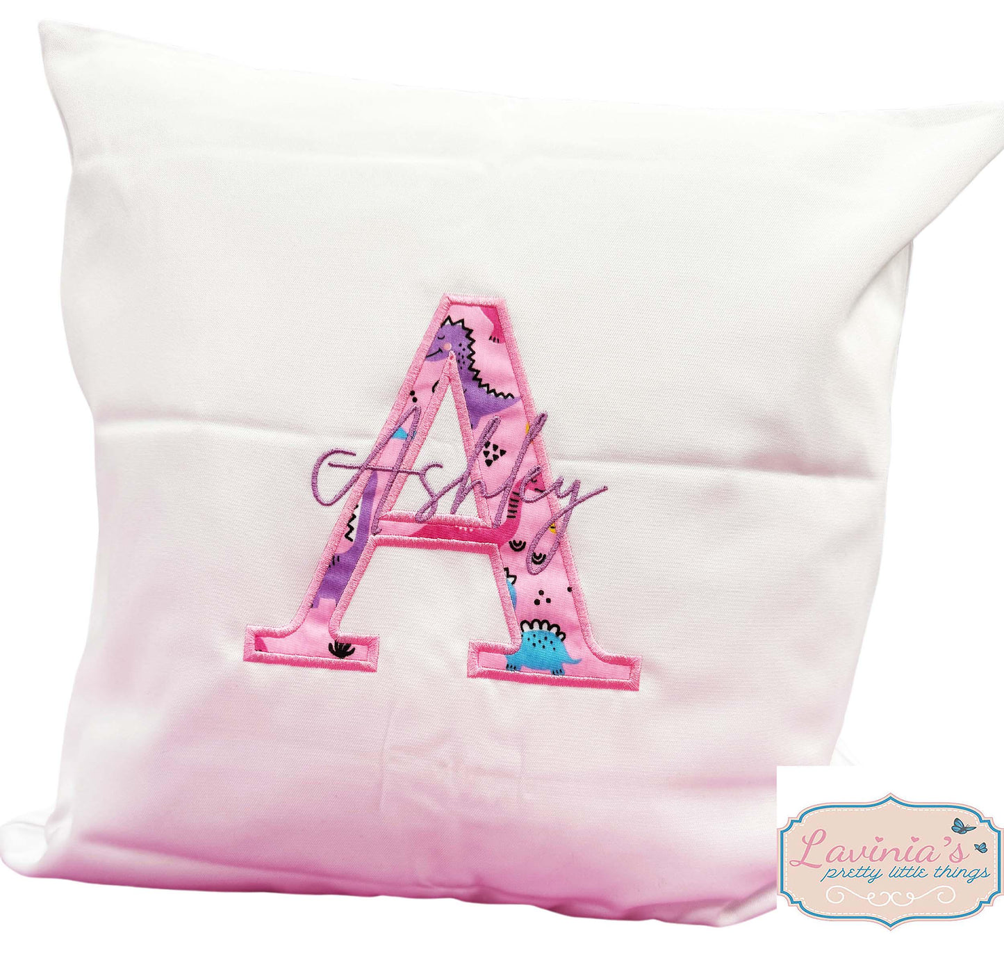 Embroidered pink dinosaur cushion