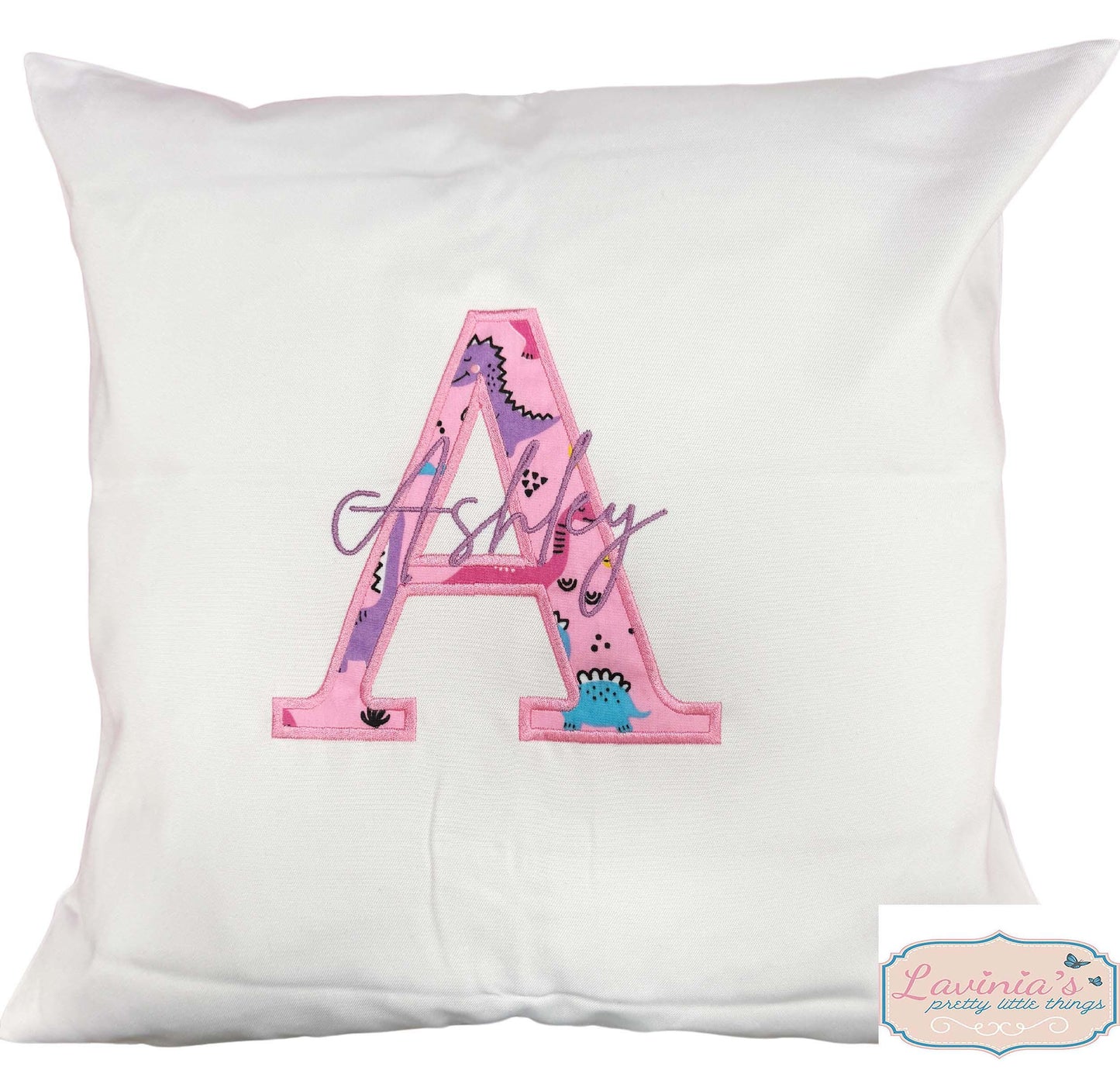 Embroidered pink dinosaur cushion